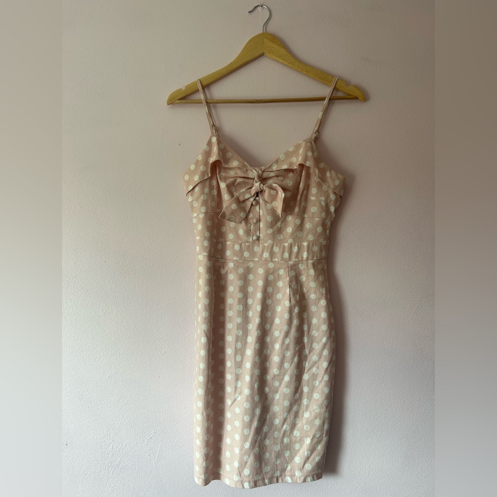 Light pink and white polka dot dress